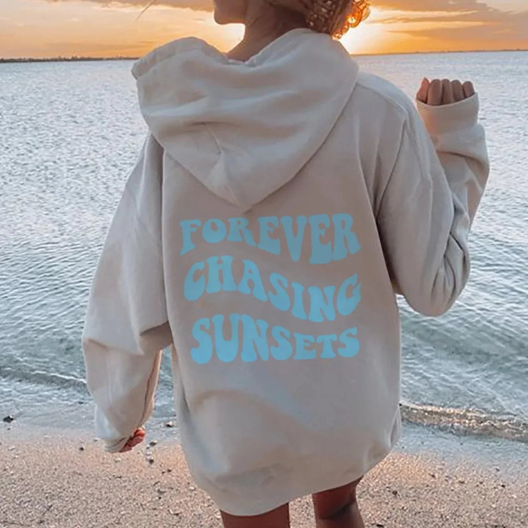 Katalina | Kapuzenpullover „Chasing Sunset“.